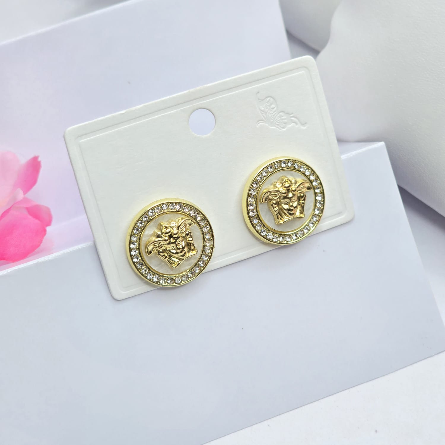 White/gold earrings
