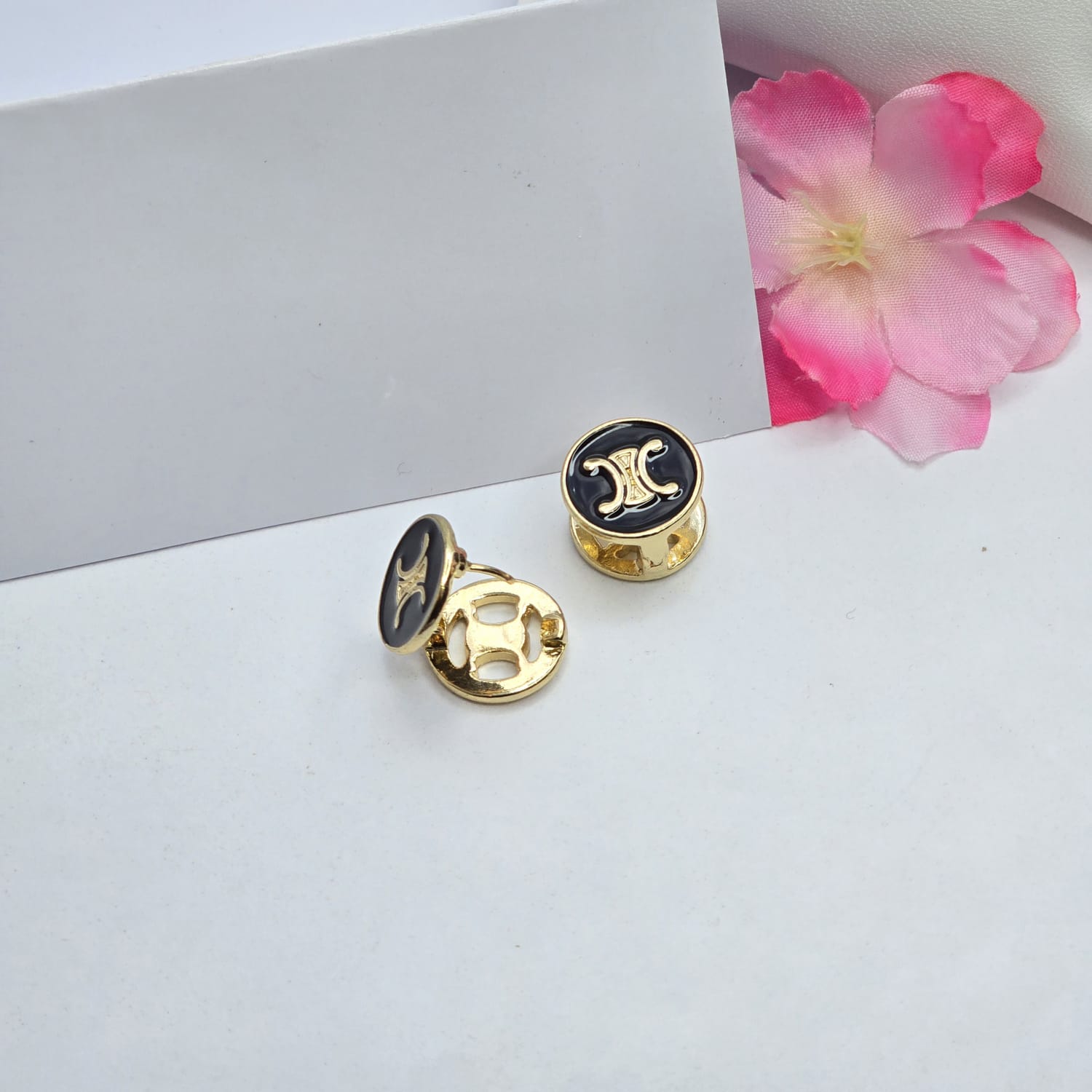 black golden earrings