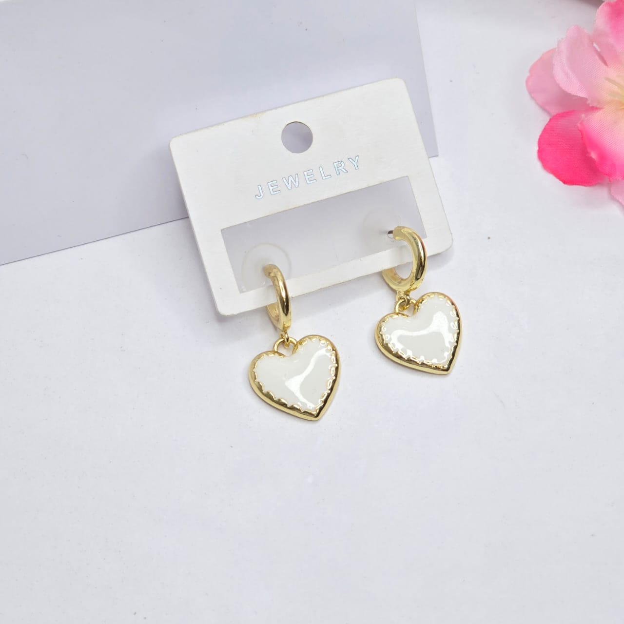 white earrings