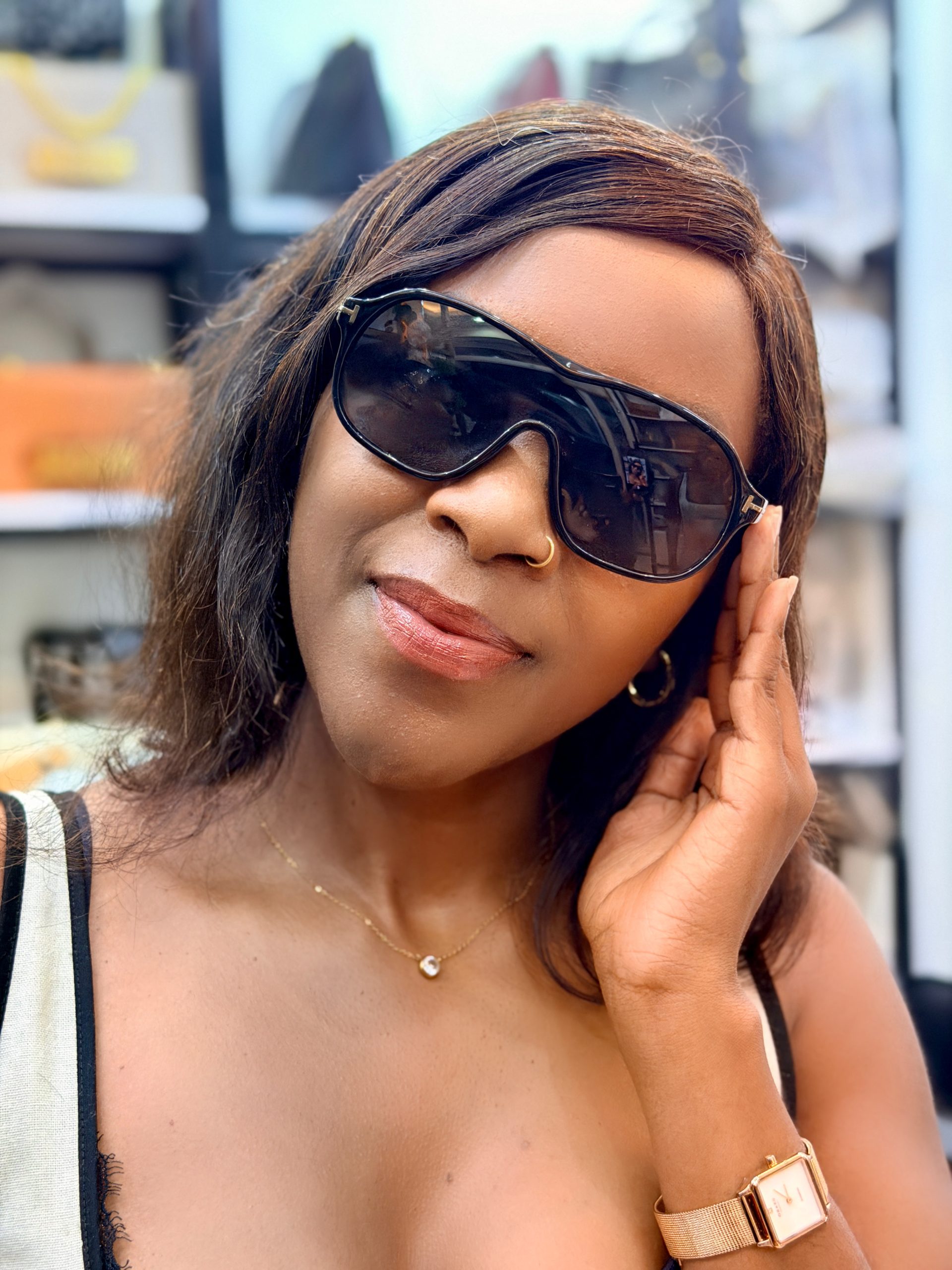 Lady wearing black sunglasses. Perfect for a sunny day.