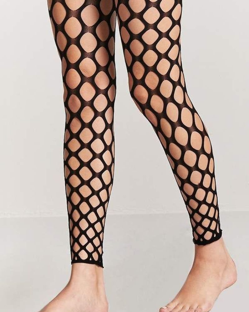 Features a seamless sheer finish, full-length coverage from waist to toe, and a comfortable, highly elasticated waistband