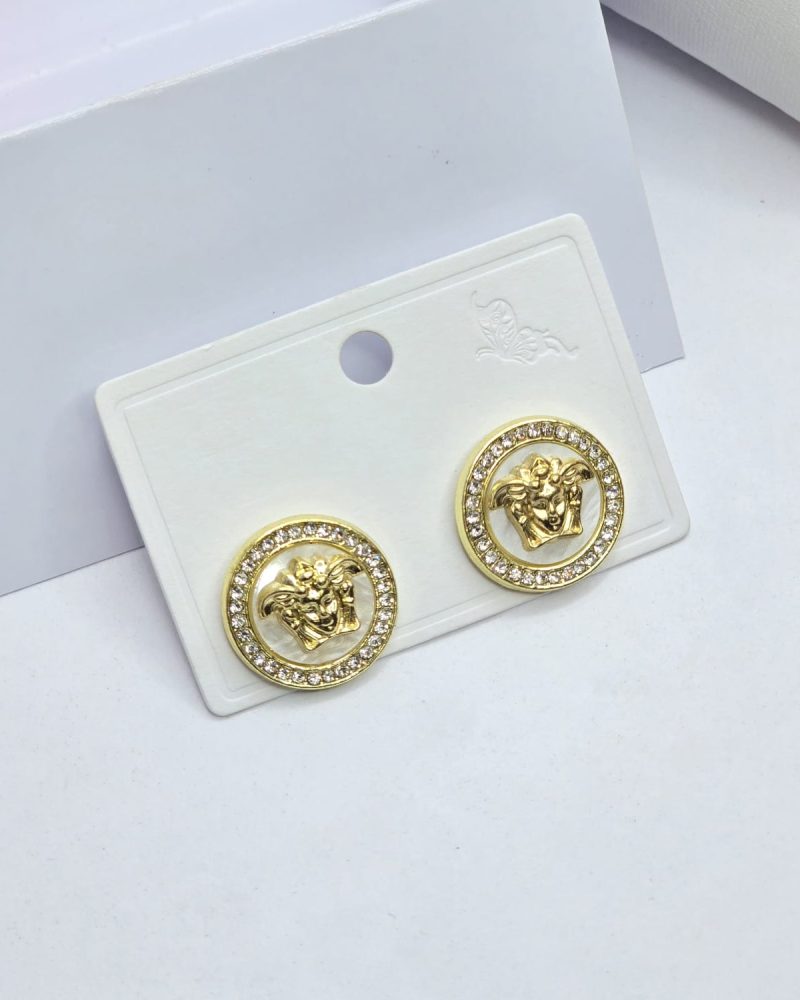 White/golden earrings